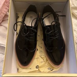 Brand new patent loafers— black with cream platforms. Never been used!